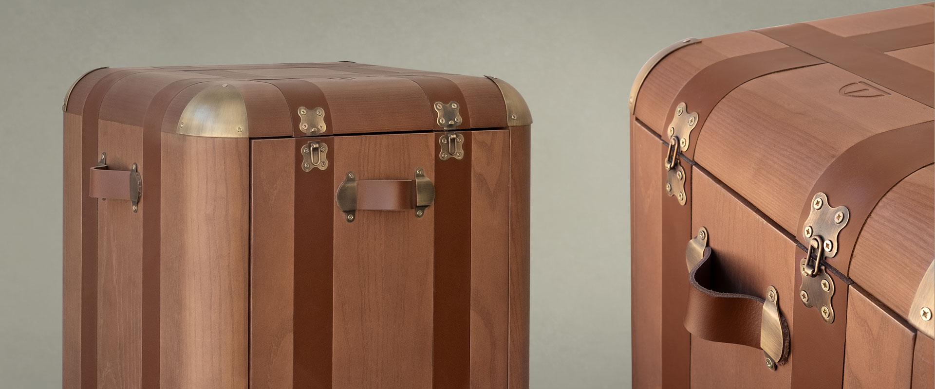 Close-up of the Burke side table with two different views highlighting the handles and leather straps.