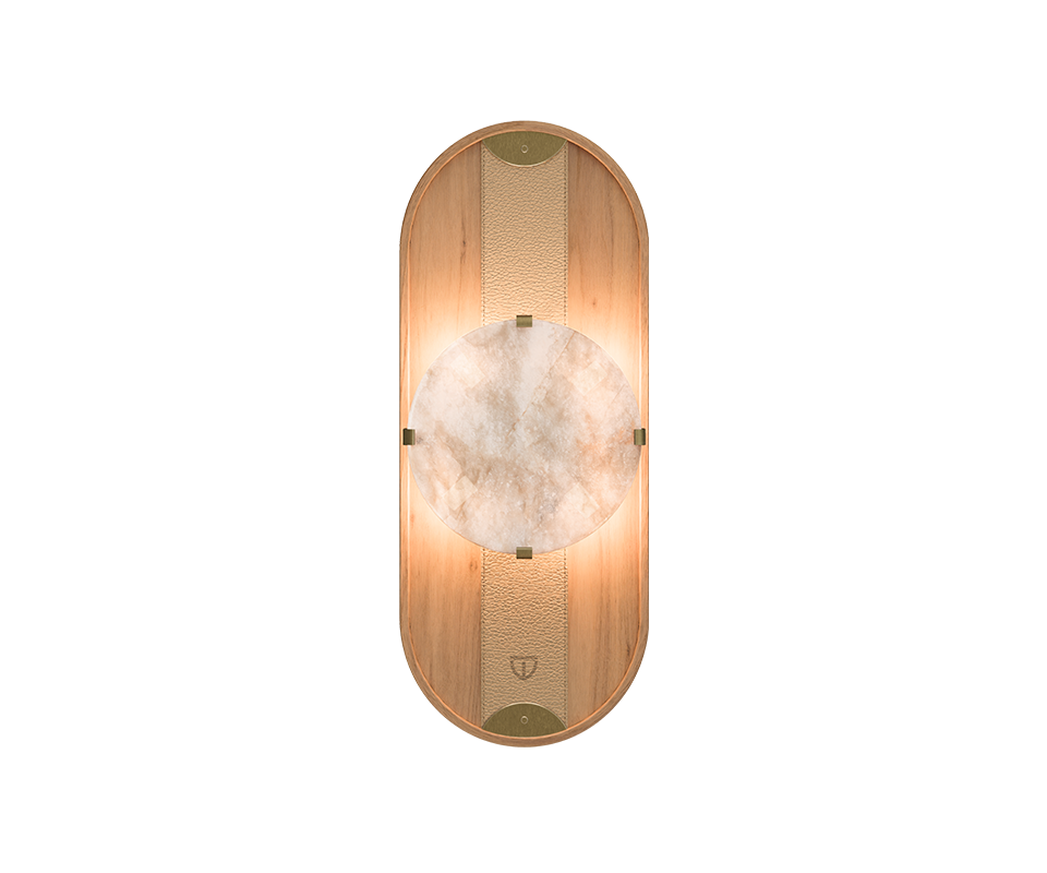 Cavendish Wall Lamp in oak, front view, with the light turned on. Alabaster softly diffuses a warm glow through its natural veins, framed by a gentle oval silhouette with aged brushed brass accents, highlighting the refined craftsmanship and elegant materials.