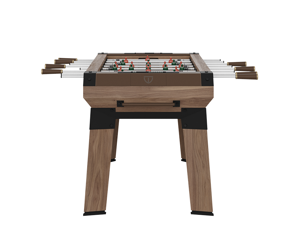 Front view of the Chesterfield Foosball Table featuring a leather-upholstered panel with the Wood Tailors Club emblem, sturdy walnut wood legs with black steel joints, and extending chrome playing rods.