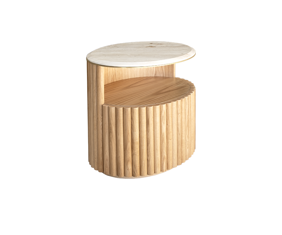 Herbert Bedside Table Herbert Bedside Table in natural oak with a travertine tabletop and brushed brass details, positioned at a 45-degree angle.