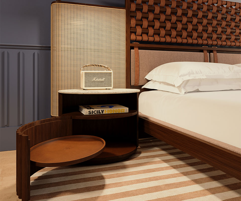 Herbert Bedside Table in a bedroom with blue and brown tones, shown with its door open, placed next to the O'Connel Bed.