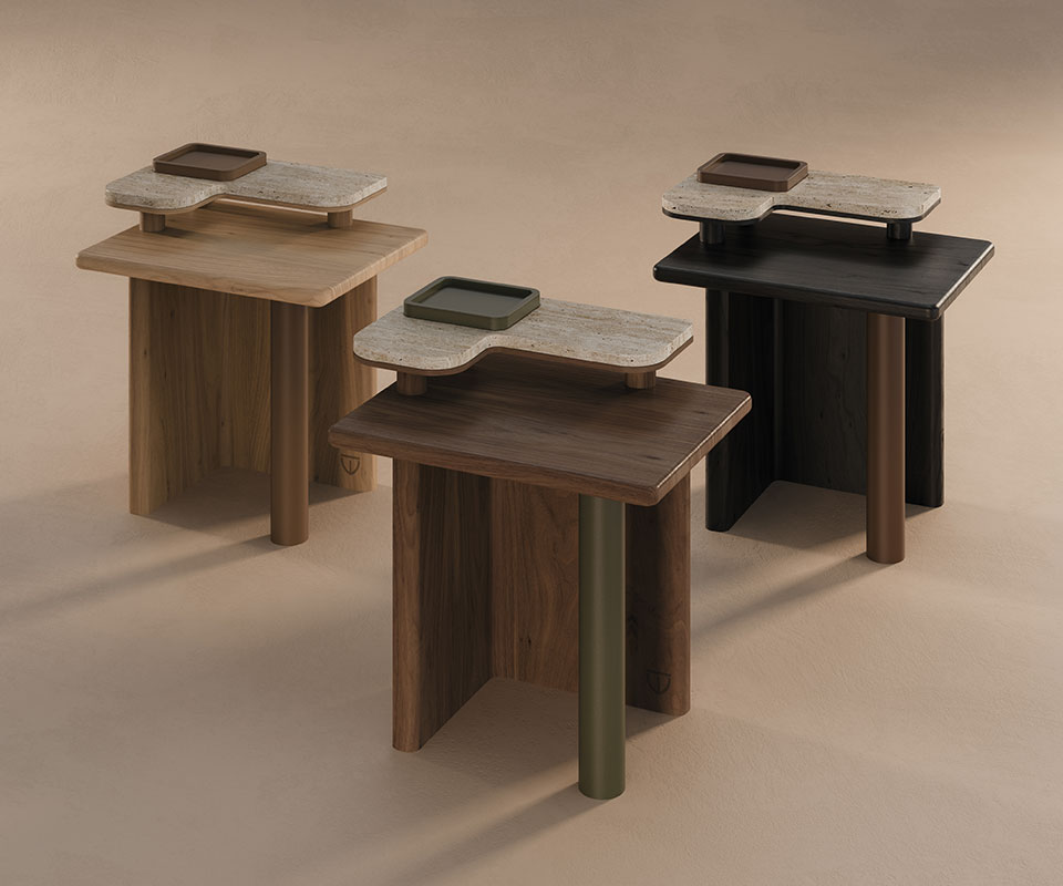 Maurier Side Table Three Maurier side tables set against a cream background, one crafted in oak, another in smoked walnut, and the last in black-stained ashwood.