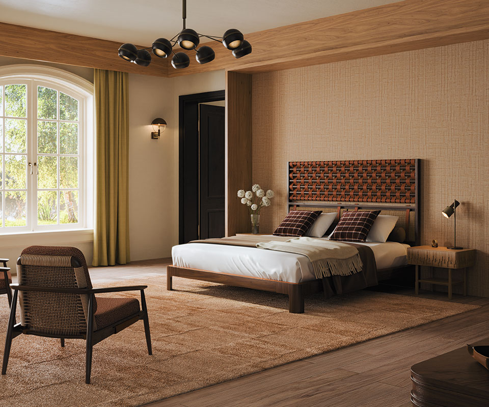 O'Connell II Bed with a headboard featuring leather details in Prestige fabric from Élitis, set in a bedroom with Élitis Abaca wallpaper, a rug by Kelly Wearstler, and Ralph Lauren Wallace throw pillows. The space also includes an Adam armchair upholstered in Melbu 11093.52 fabric by Nobilis, a Fleming suspension lamp, and a Faraday wall lamp.