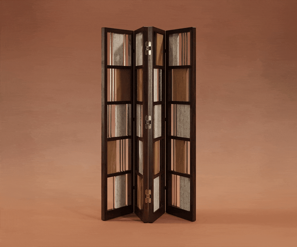 Wordsworth folding screen opening and closing in smoked walnut wood, natural oak, travertine, and brass, set against a burnt orange background.